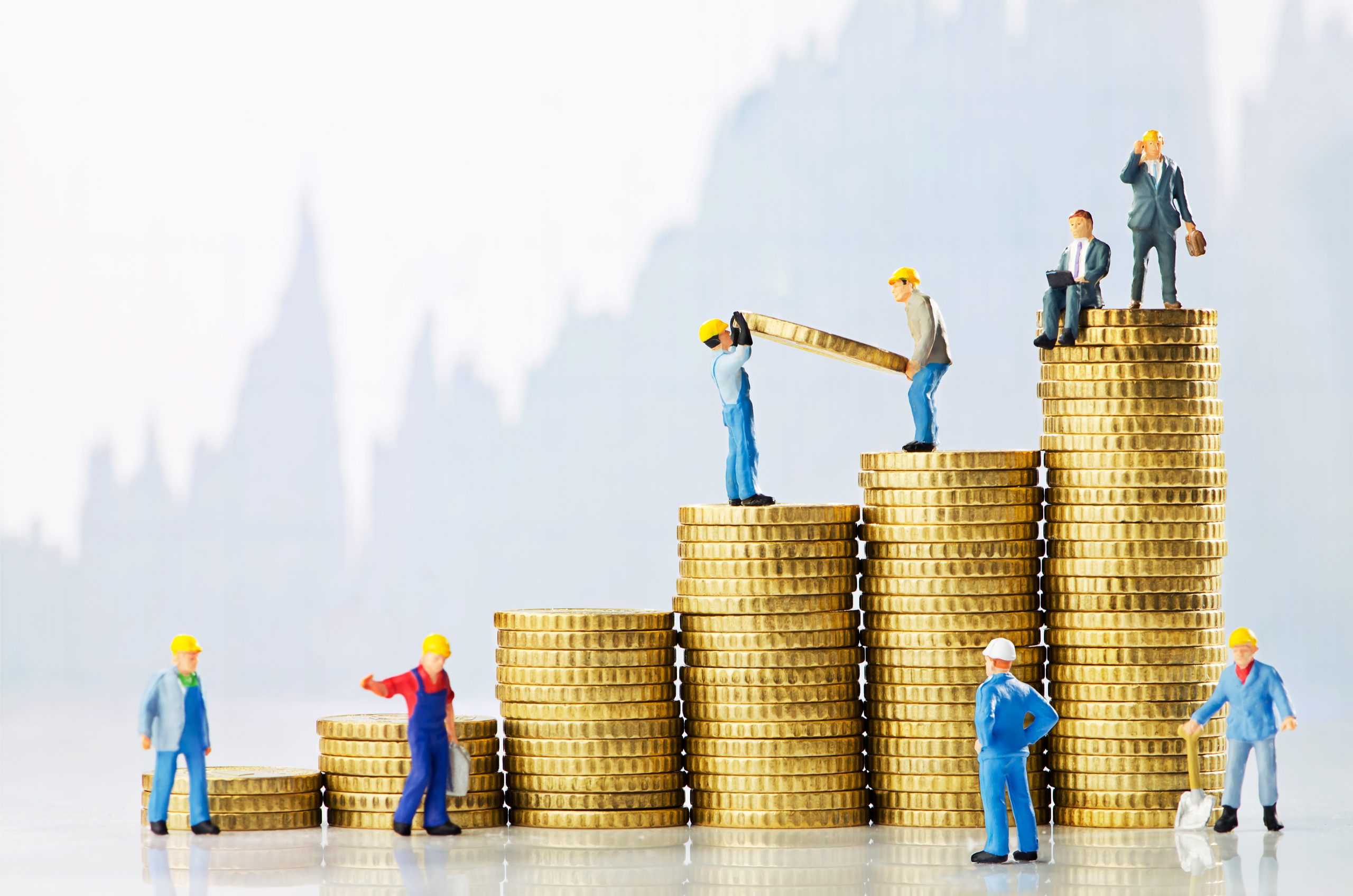Construction Accounting, construction figurines climbing increasingly large stacks of coins